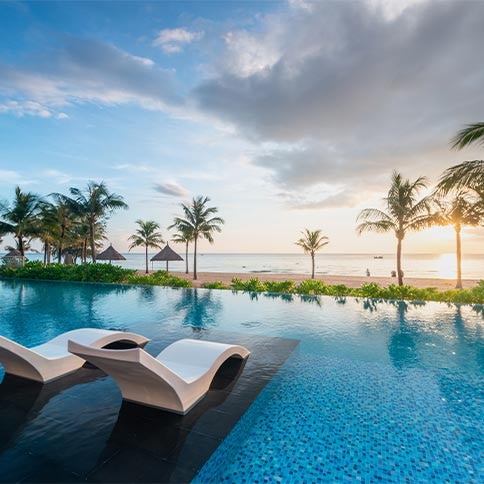pool chairs by the beach