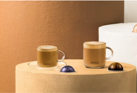 Two cappuccinos and coffee pods